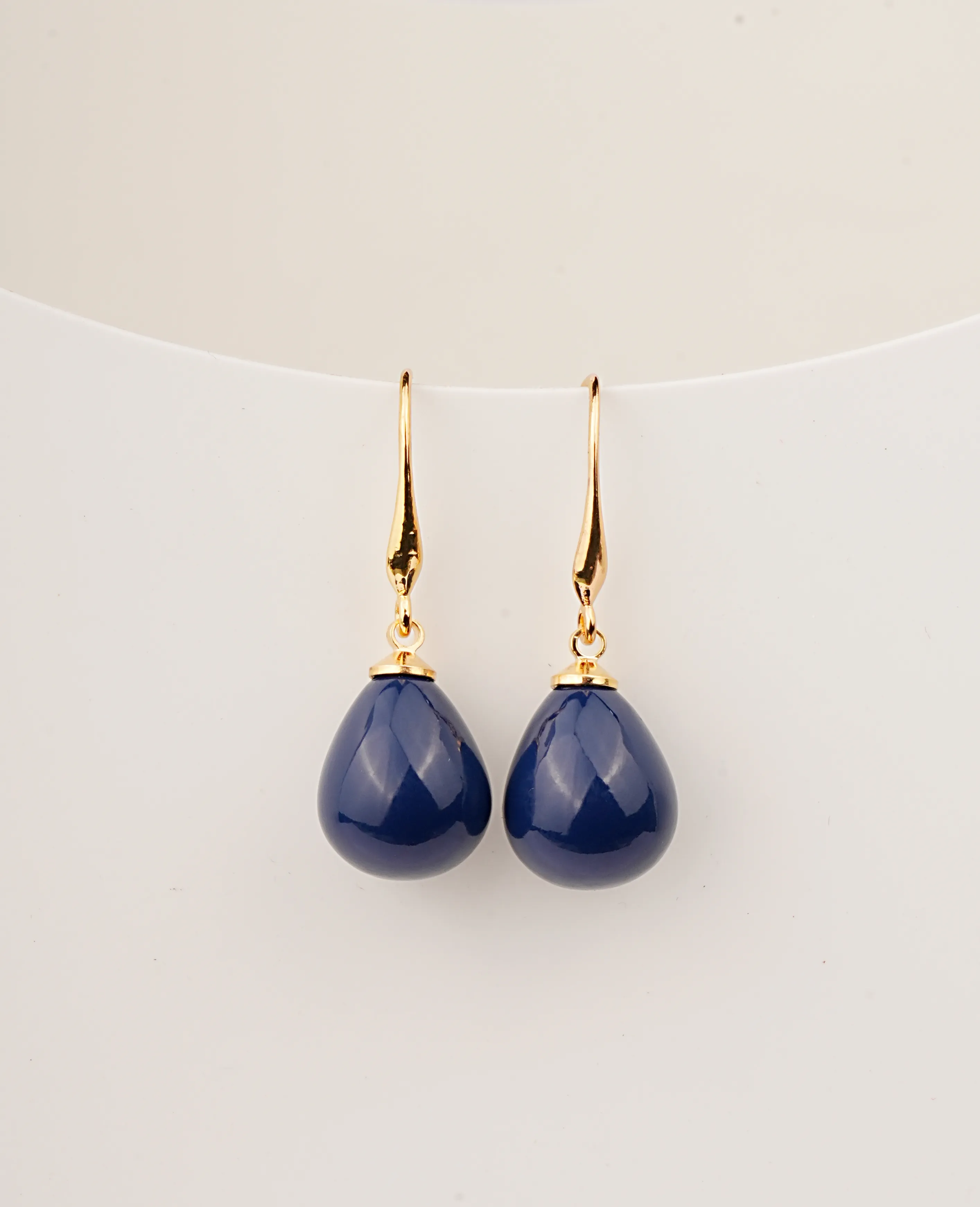 Glossy Blue Clip-Ons – Striking Elegance with Every Wear