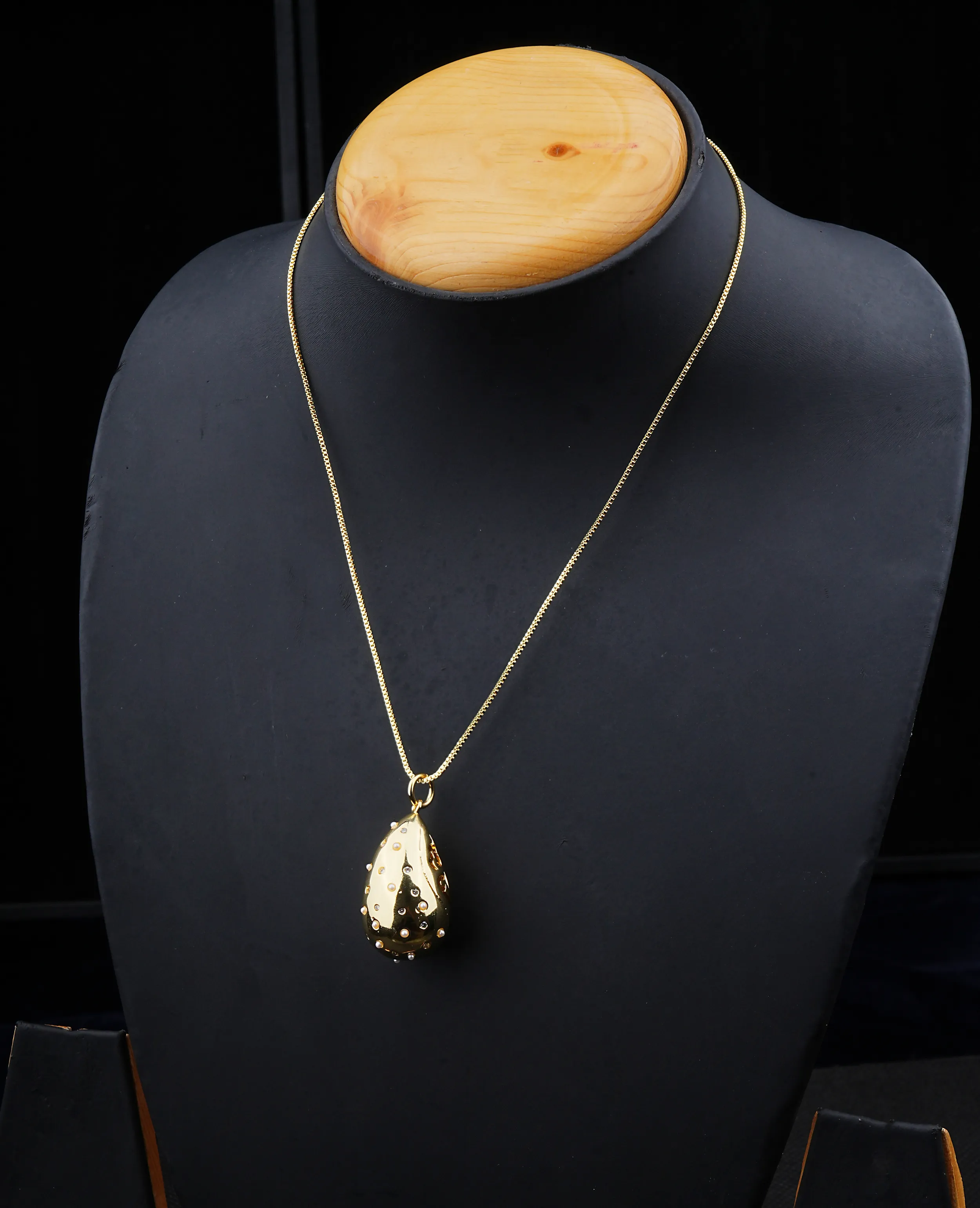 AD Studded Golden Metallic Drop Chain Pendant